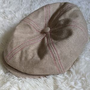 Pistil Y2K Wool Newsboy cap hat, cream beige tan, pink detail, women's golf